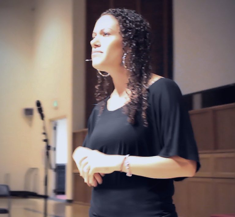 Lora Ziebro speaking to an audience